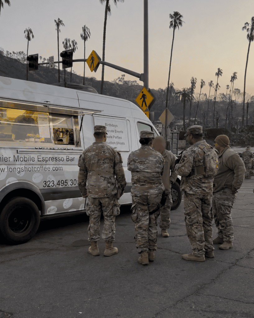 Soldiers in camouflage at mobile espresso truck